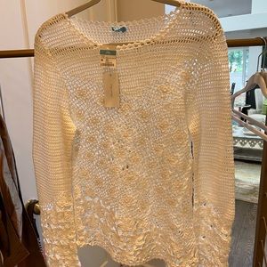 White crocheted pullover.
